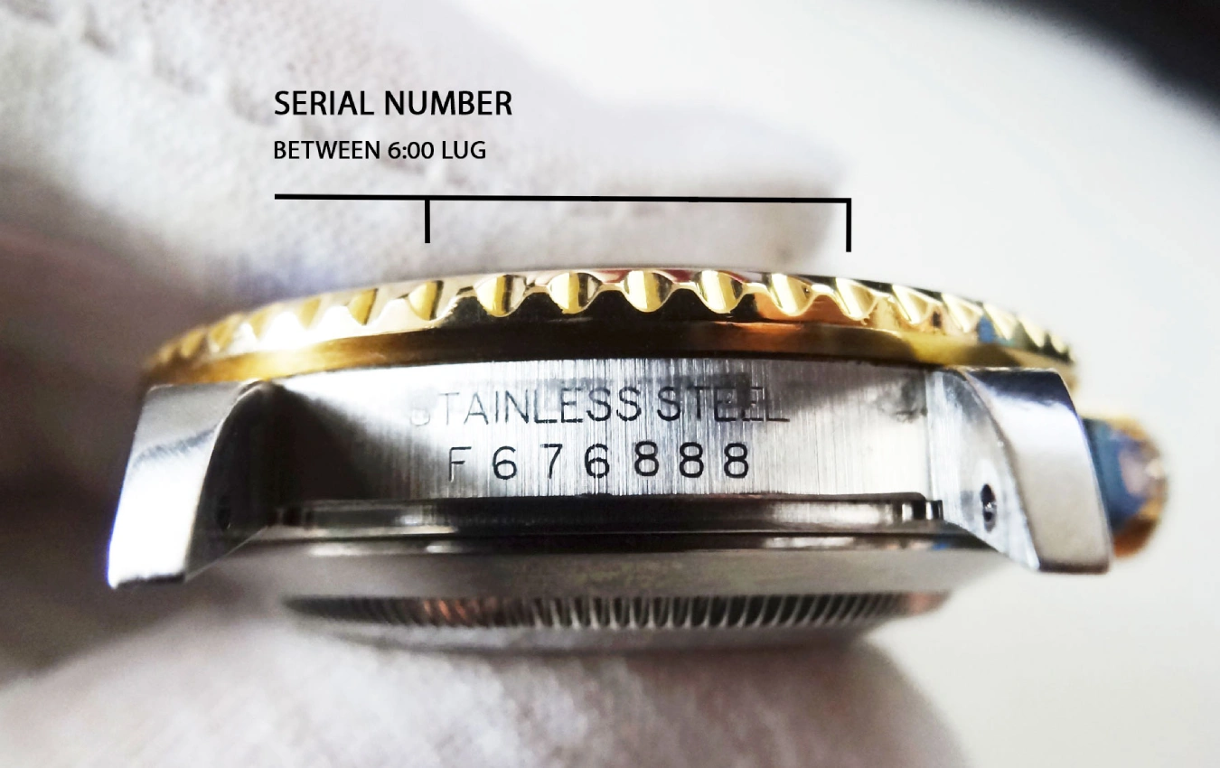 Rolex serial number location between the lugs at 6 oclock on older models