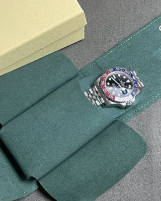 GMT Master II Pepsi placed inside premium green watch travel pouch