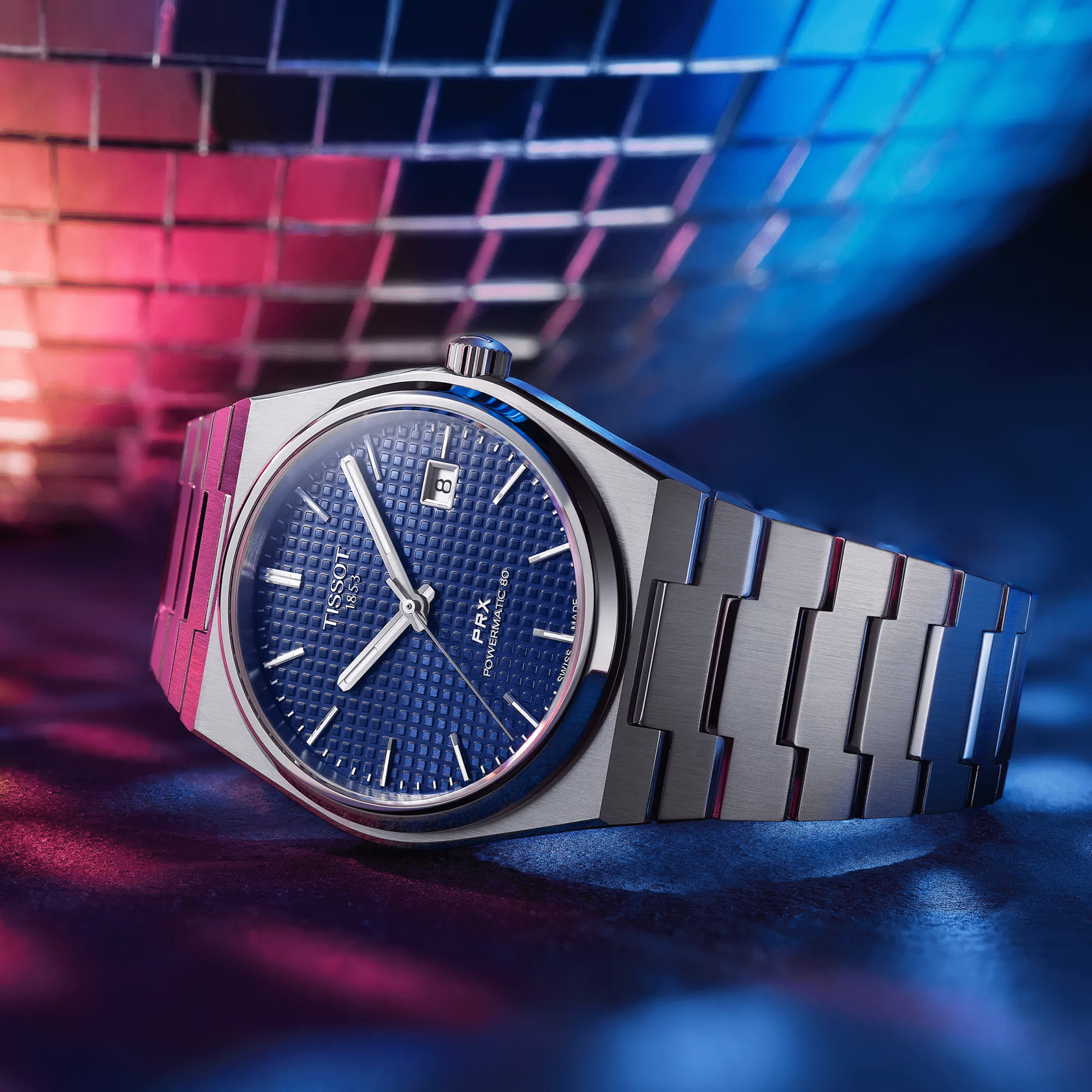 Tissot PRX Powermatic 80 blue dial on integrated steel bracelet watch