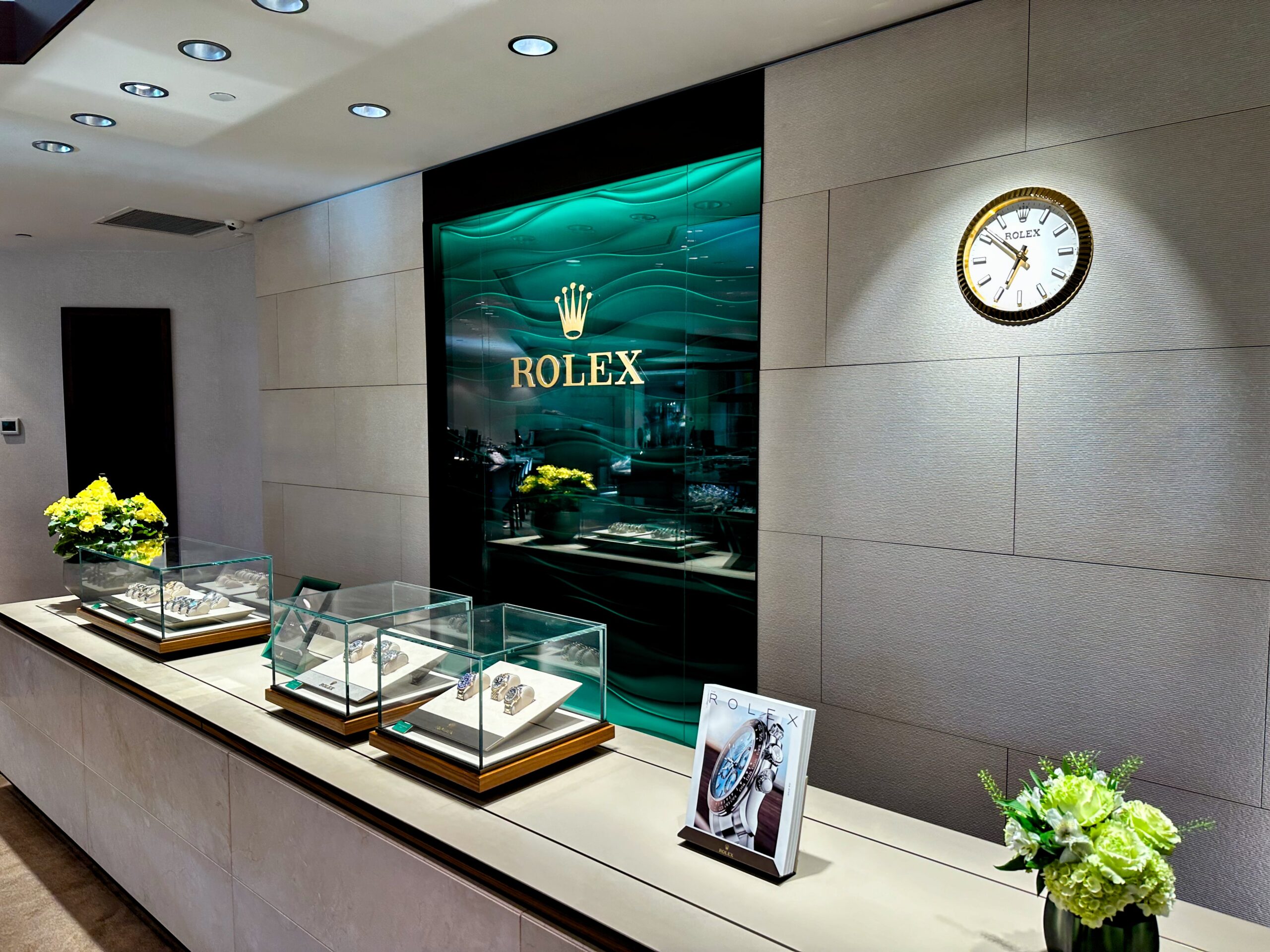 Inside a Rolex authorized dealer boutique showcasing luxury watches