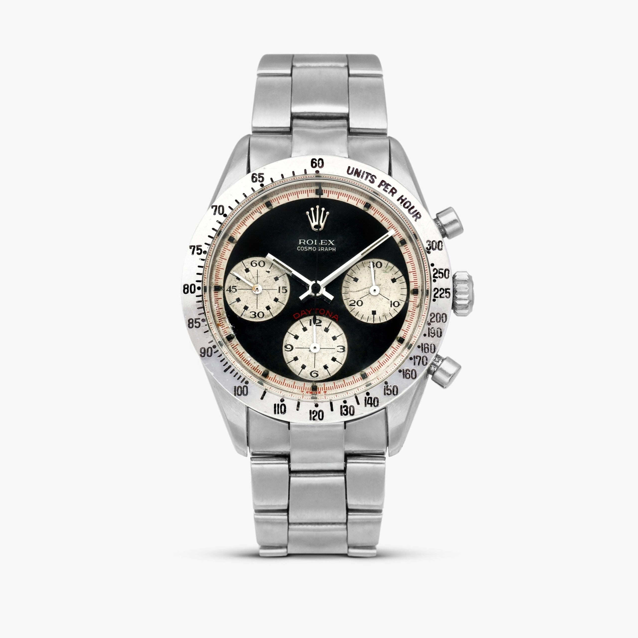 Macro of a vintage Rolex Daytona Paul Newman ref. 6239 exotic dial showing art-deco subdials, square-tipped indexes, and a contrasting outer track — the factory dial variant now worth millions.